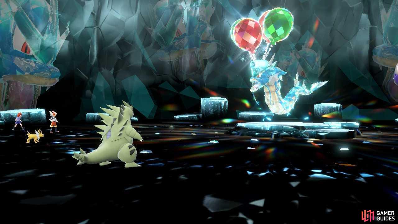 Tyranitar faces off against a Flying Tera Type Gyrados Tera Raid